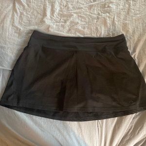 Champion tennis skirt. Size large color: Black